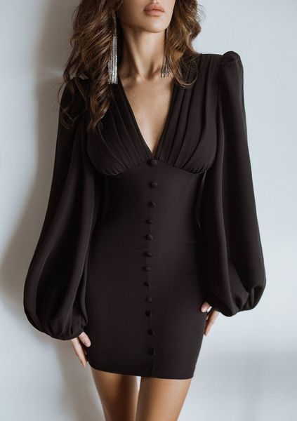 Сукня міні з об'ємними рукавами і трикутним вирізом на спині чорна 1350 фото