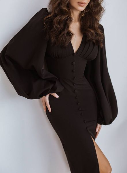 Сукня міді з об'ємними рукавами і трикутним вирізом на спині чорна 1353 фото